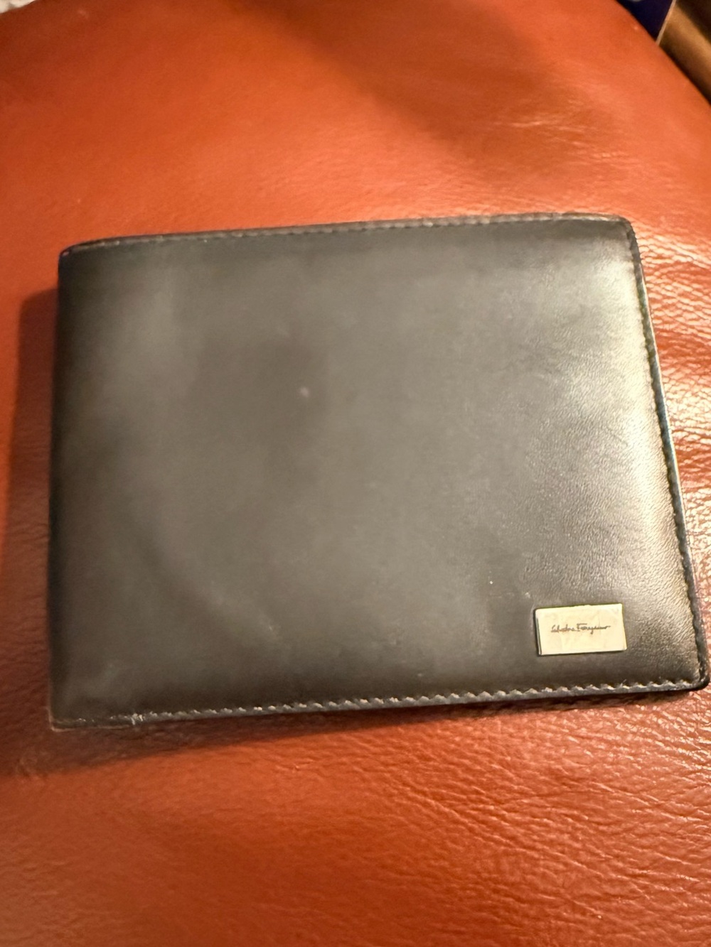 Salvatore Ferragamo Black Leather Wallet with Metal Logo Plaque
